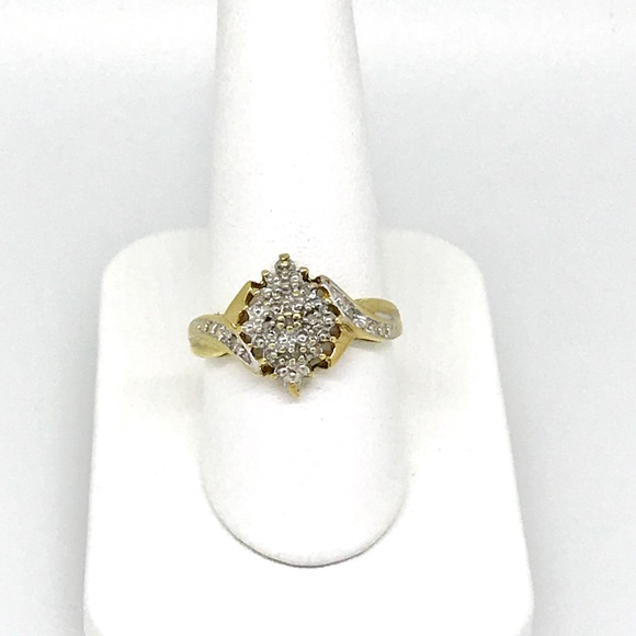 Jewelry - .08 ctw 10 kt ladies cocktail ring